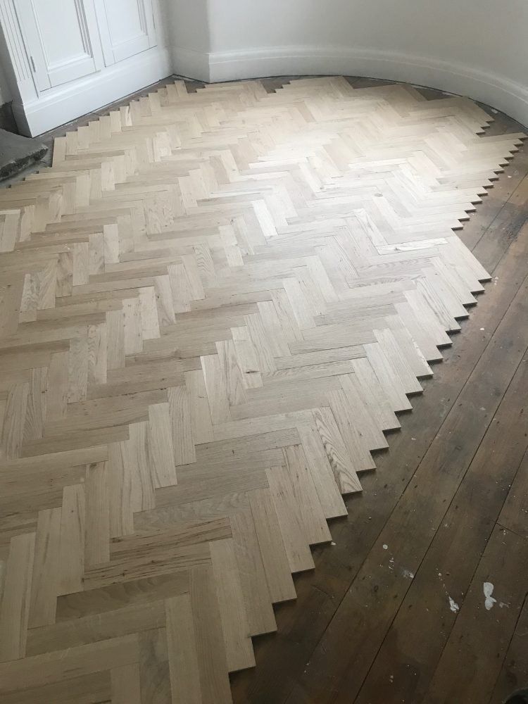 Herringbone floor installation in London